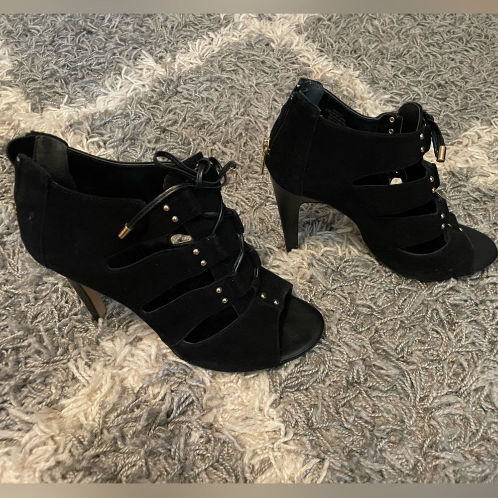 Isola black 8.5 peep toe heel. Like new. Gold detail, zipper closure